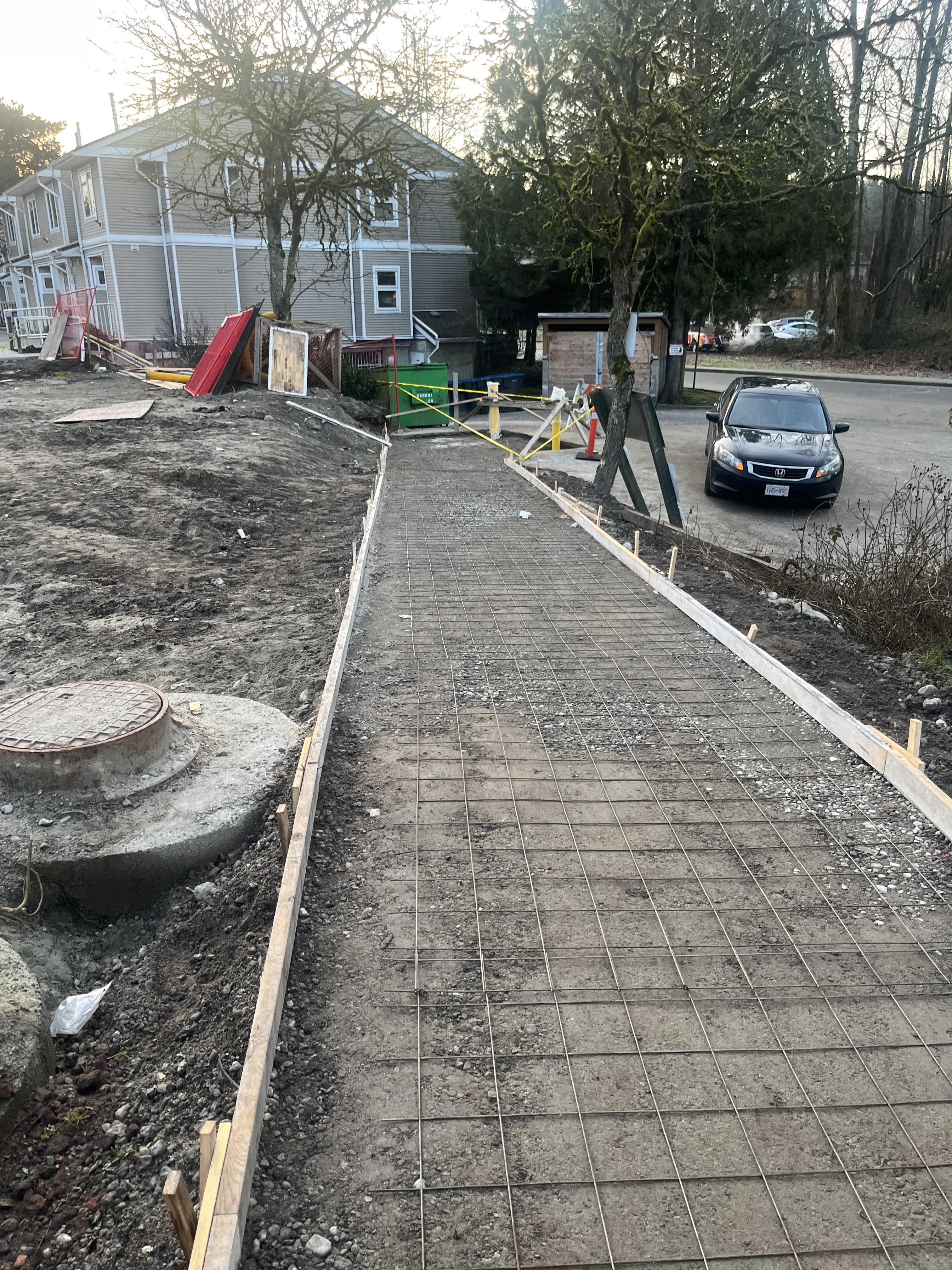 Reinforced formwork for a concrete walkway
